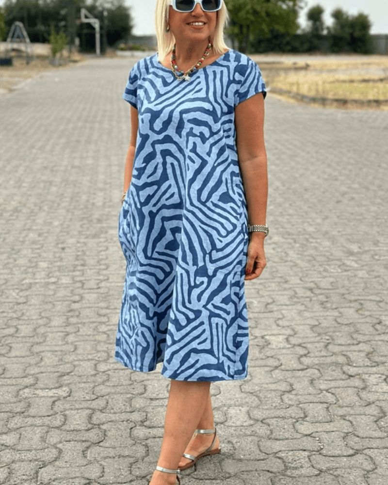 Nelia™ – Summer Dress with Round Neckline and Lovely Print