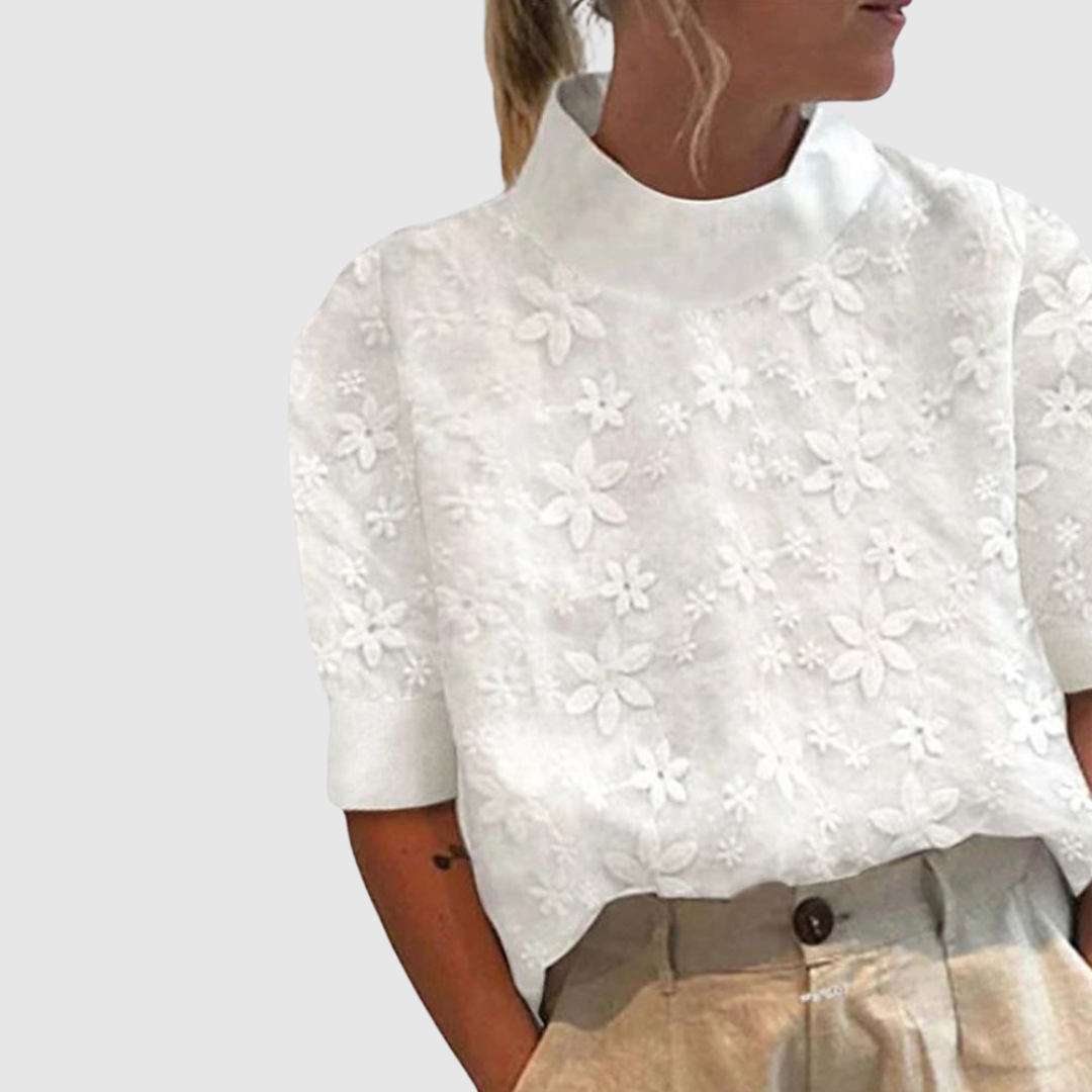Délia™ | Blouse à col haut brodé